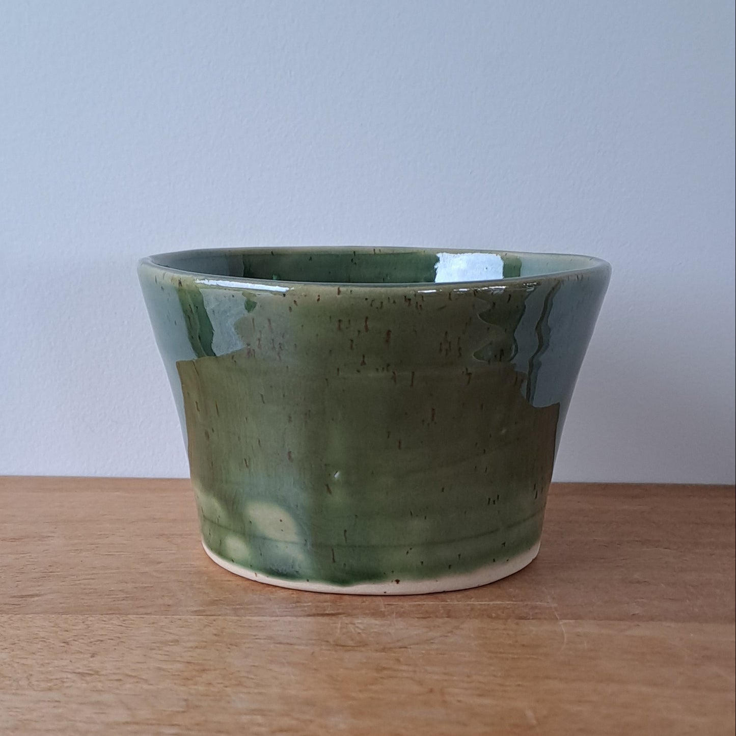 Small speckled stoneware ceramic planter with jade glaze