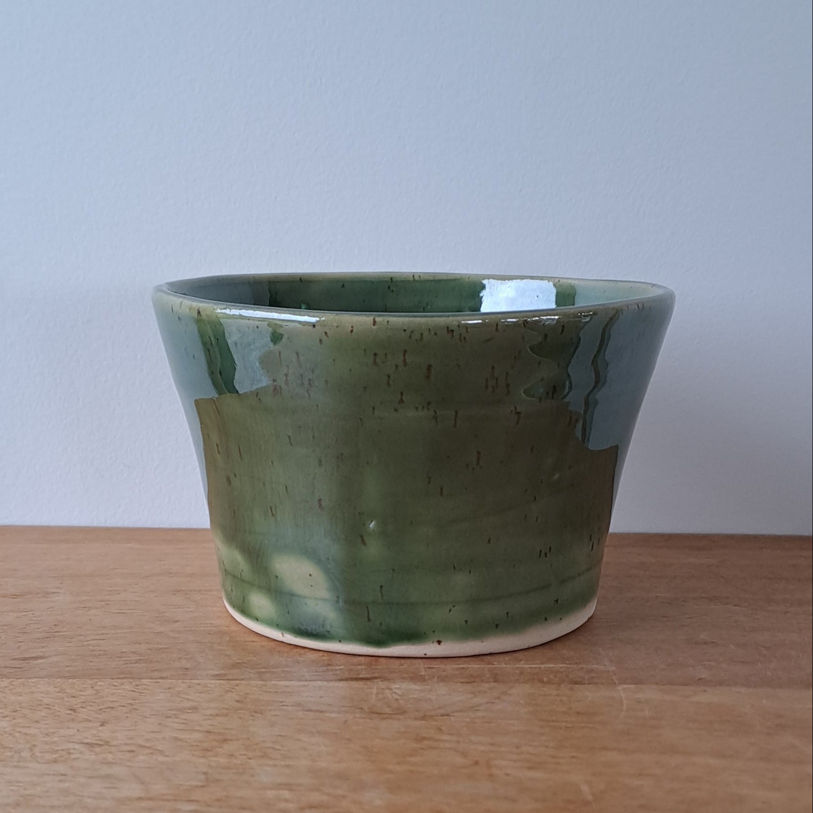 Small speckled stoneware ceramic planter with jade glaze
