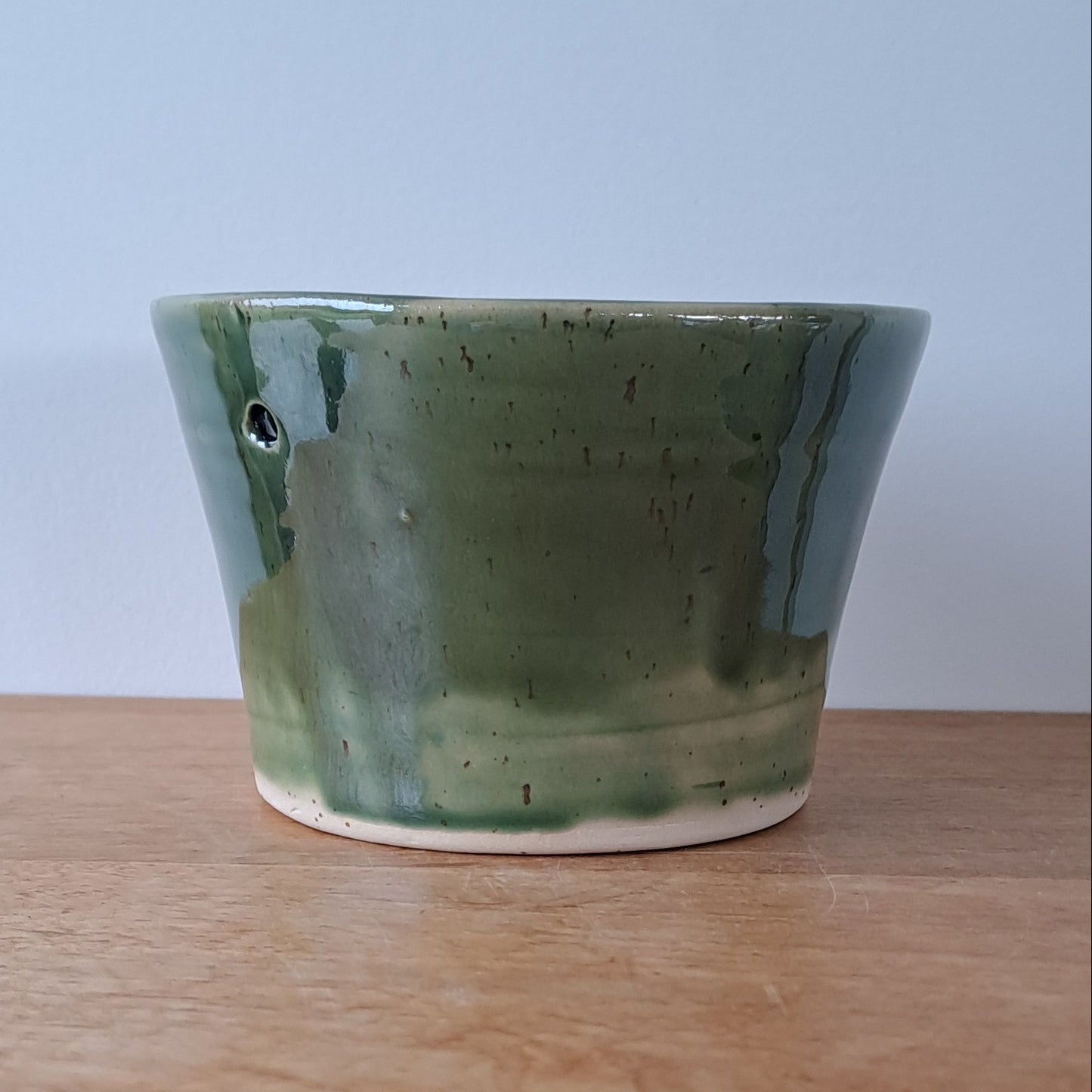Small speckled stoneware ceramic planter with jade glaze
