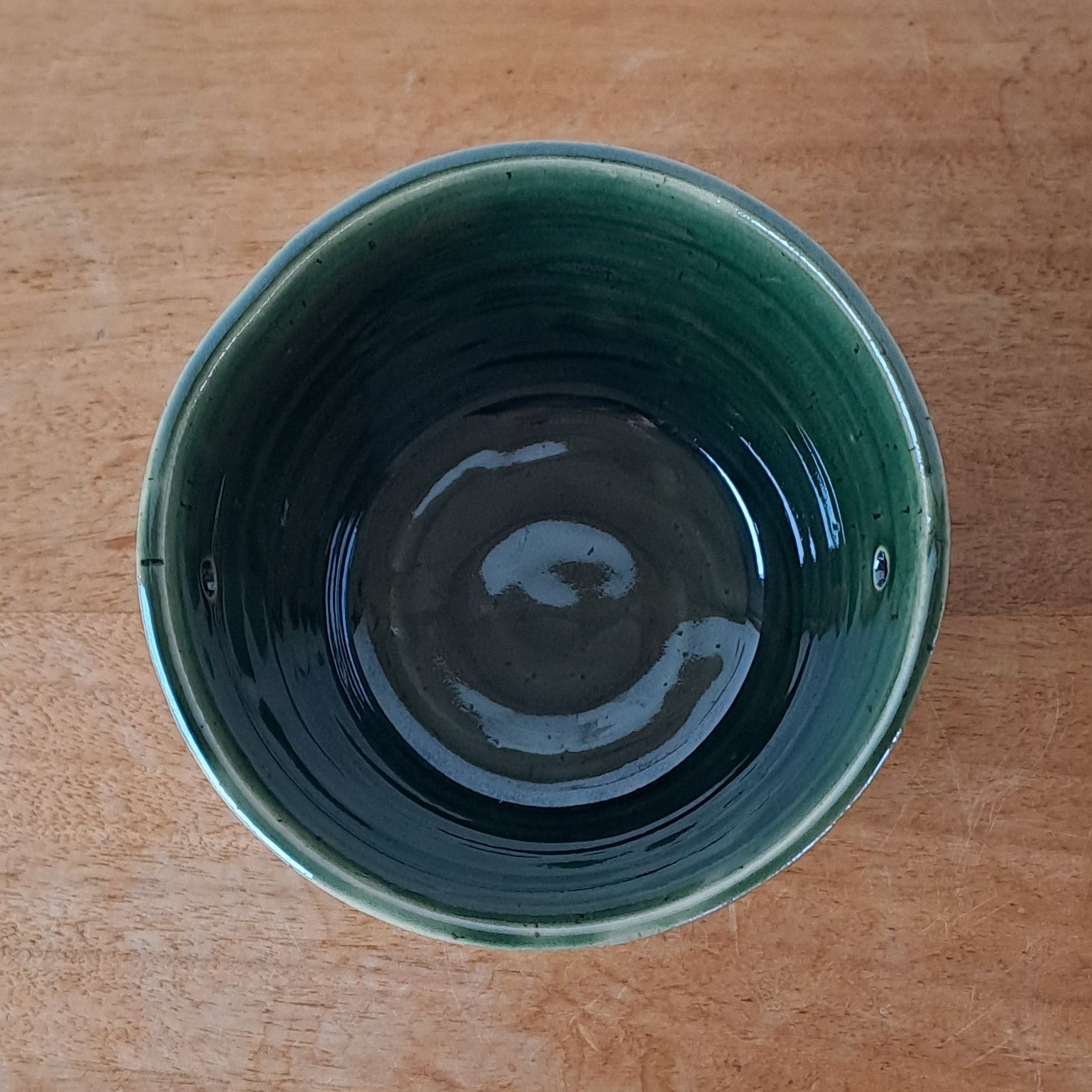 Small speckled stoneware ceramic planter with jade glaze