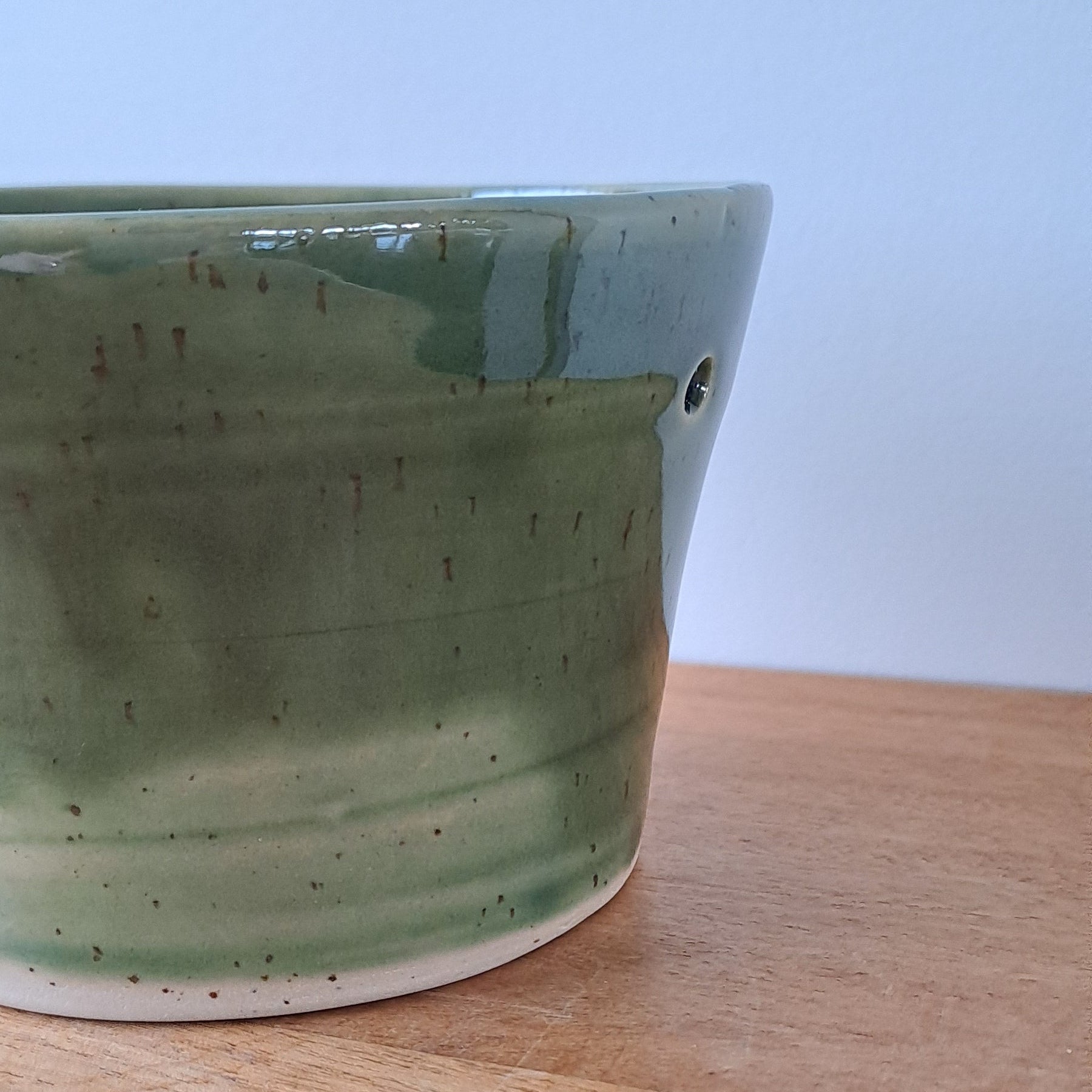 Small speckled stoneware ceramic planter with jade glaze