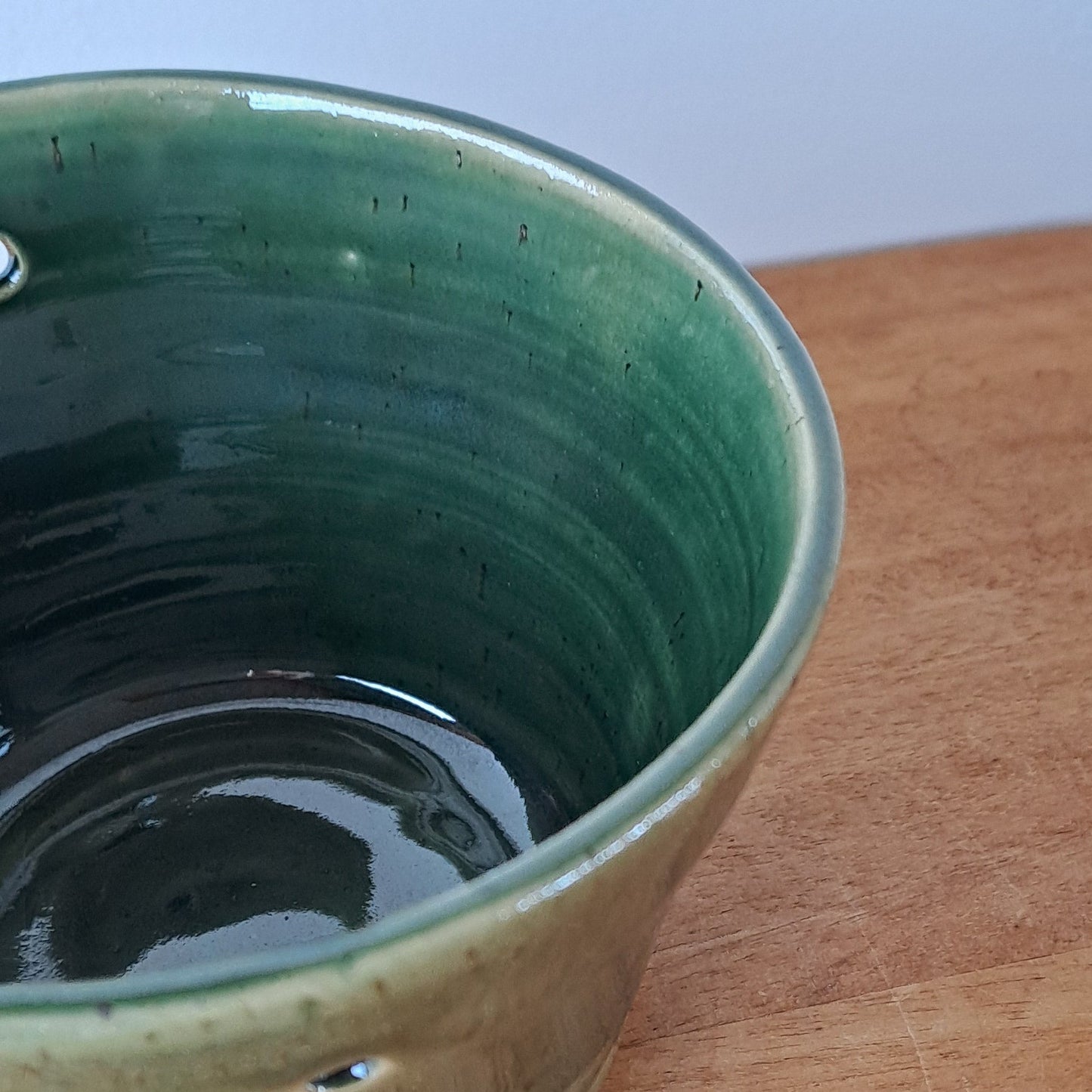 Small speckled stoneware ceramic planter with jade glaze